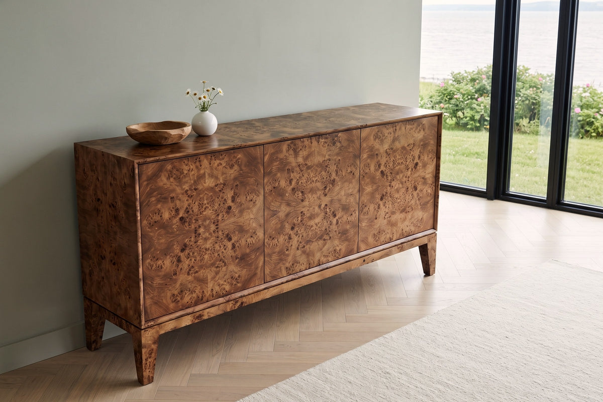 Polcenigo sideboard in Dark Burl seen from above against a sage-grey limewash wall in a Rimouski house