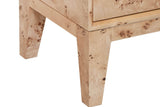 Close-up of the Polcenigo sideboard in Honey Blonde Burl at a corner: the bottom of a door, a thin shadow line