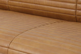 Close-up of the Pontremoli seat: light tan top-stitching along the channels and the seam between two seat cushions