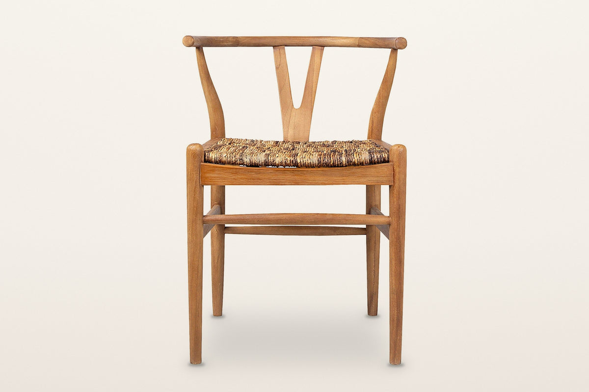 Poppi Y-back dining chair in Brown, front view on a warm white studio backdrop: a curved top rail, a Y-shaped back splat