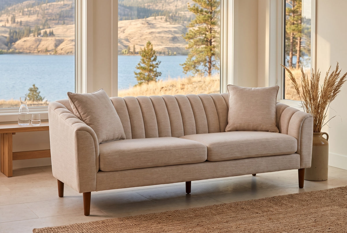 Prato sofa in a Kelowna lake house, wide windows onto the lake and golden hills