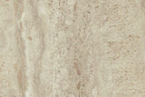 Prescott travertine-look ceramic surface close-up in warm beige