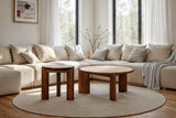 Prescott side table next to the matching coffee table in front of a cream sectional