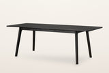 Prescott extension dining table in Antique Black opened to 86 in, the folding centre leaf in place