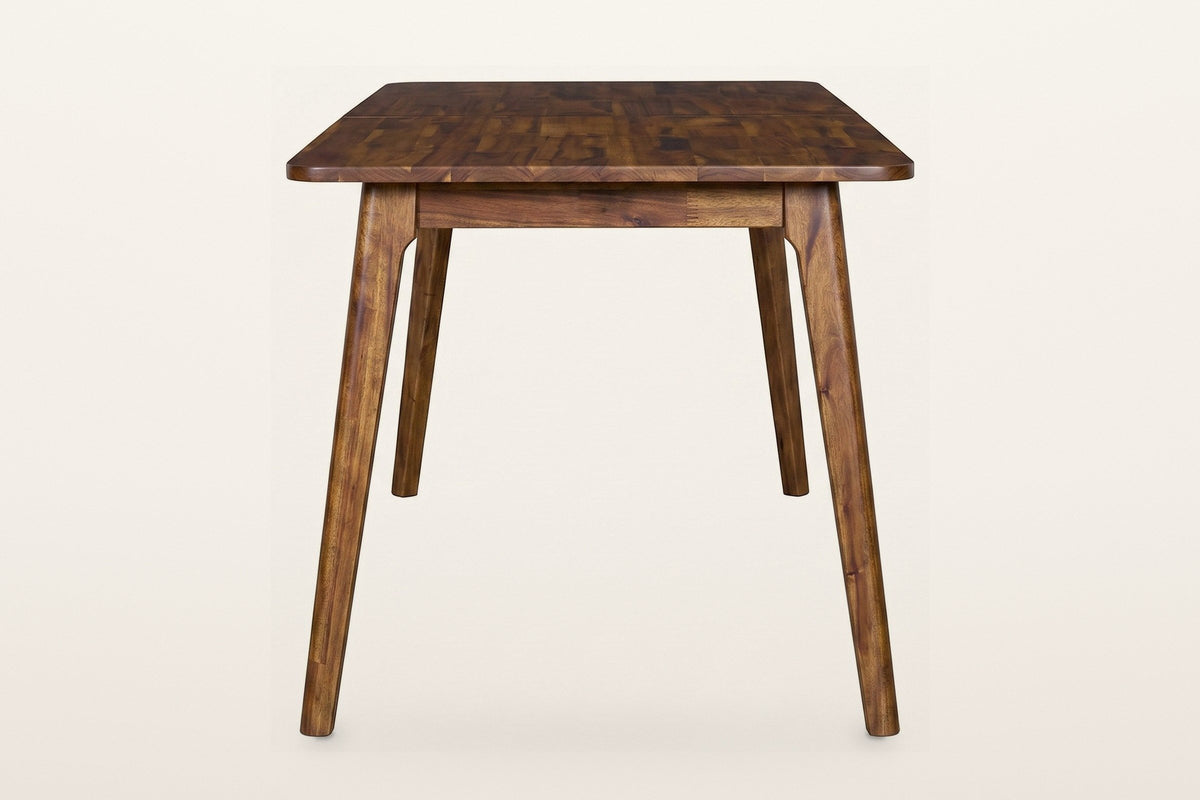End view of the Prescott extension dining table in Brown: two round tapered legs splaying out from the apron, each with a small curved notch