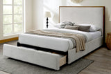 Quinn Queen platform bed in oat fabric with drawer open in a bright bedroom
