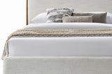 Quinn King platform bed in oat fabric, close view of padded rails and headboard
