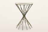 Rango side table, front view on a warm white studio backdrop: the round tray top on a thin ring