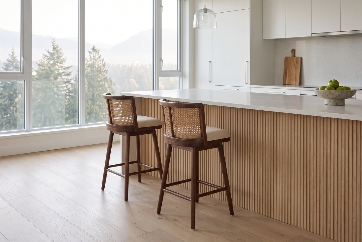 Two Rasiglia counter stools at a fluted oak island with a stone top in a bright Vancouver condo kitchen