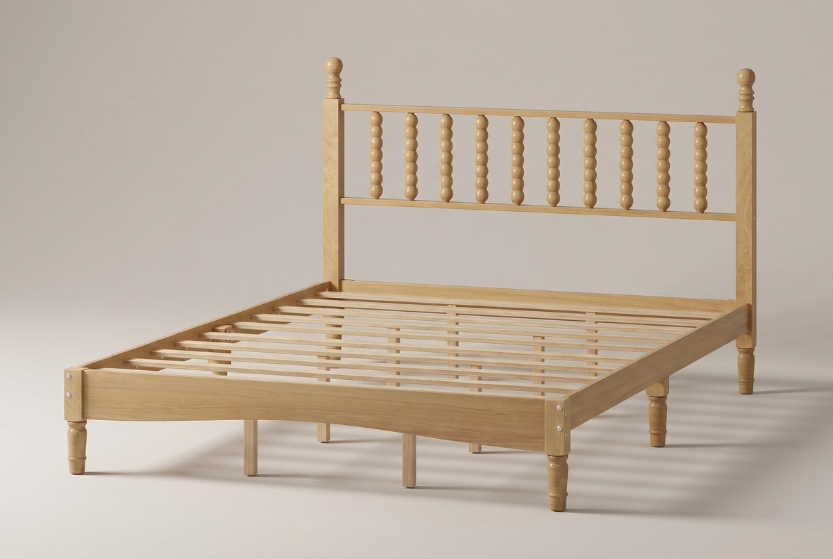 Ravenna wood spindle bed in Natural, three-quarter view on a warm off-white studio backdrop