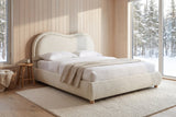 Recanati cloud bed in a cedar-clad cabin bedroom with snowy spruce forest through a tall window