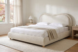 Recanati cloud bed made up with white linen in a bright Craftsman bedroom with sheer curtains and a red Japanese maple outsid