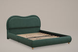 Recanati cloud bed in forest green chenille, three-quarter view of the bare frame with wood slats on a warm grey studio backd
