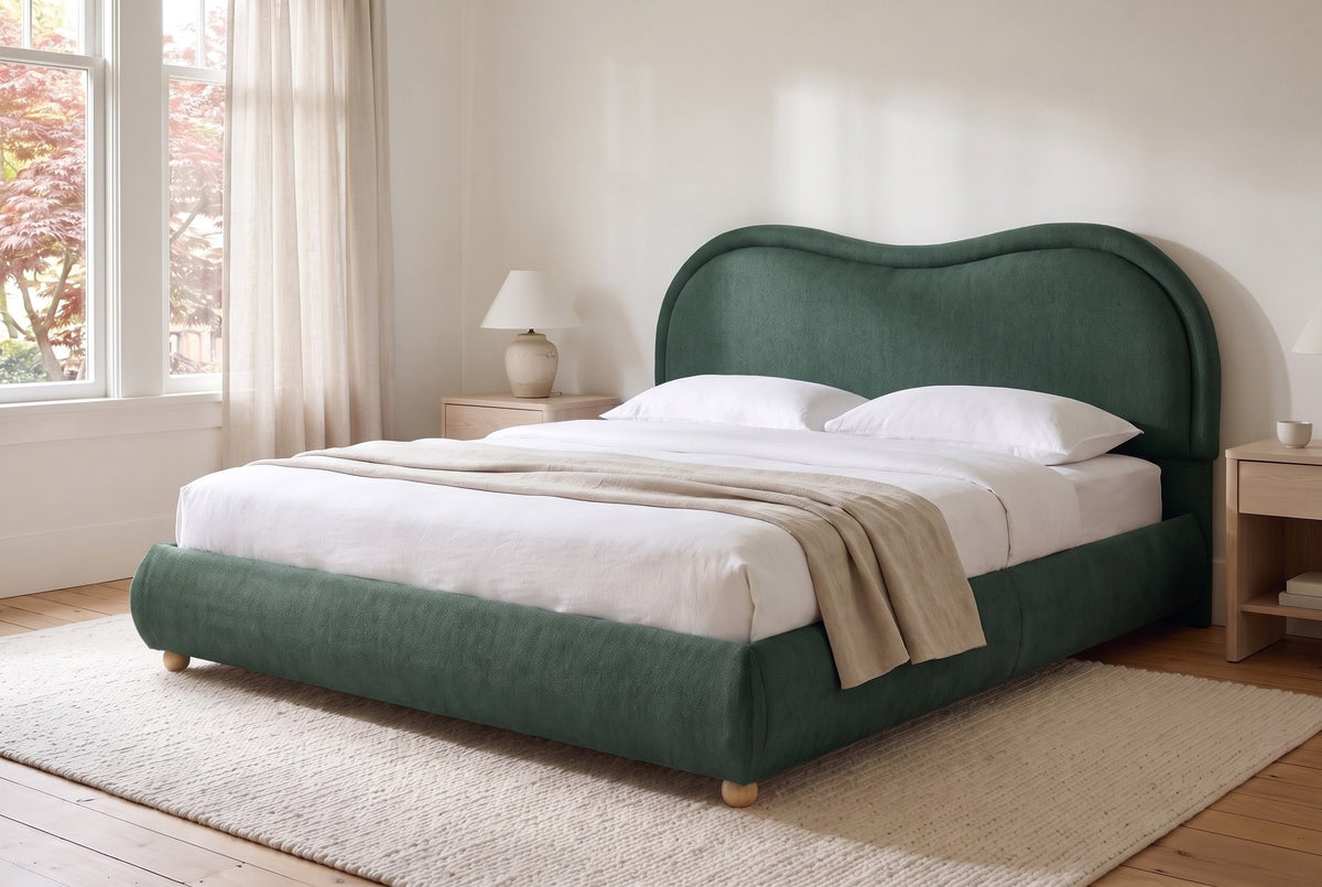 Recanati cloud bed in forest green chenille, made up with white linen in a bright Craftsman bedroom with sheer curtains