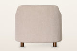 Ripatransone accent chair in Beige from behind on a warm white studio backdrop: a plain rounded back on four short round legs