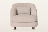 Ripatransone accent chair in Beige, straight front view on a warm white studio backdrop: the curved back