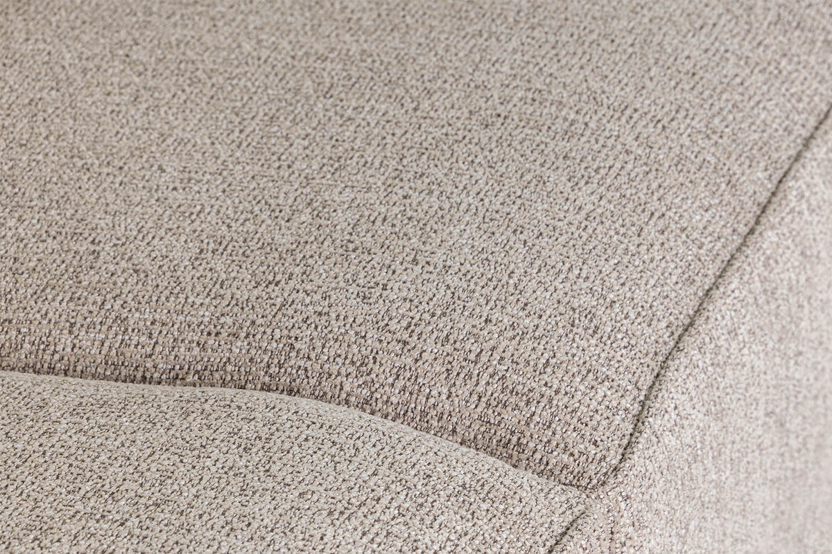 Close-up of the Ripatransone fabric in Beige: a nubby, textured polyester weave and the seam where the back meets the arm