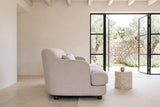 Ripatransone sofa in Beige in side profile in a Melides courtyard house