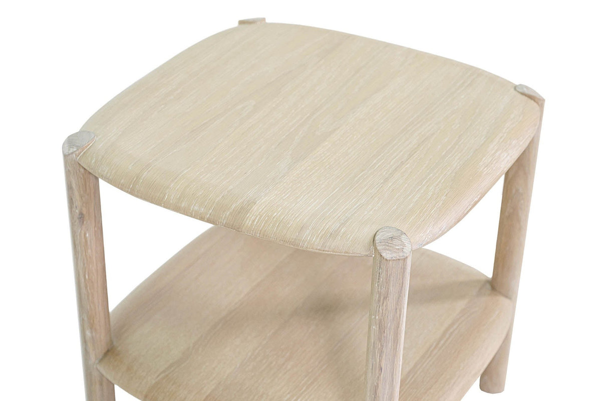 Close-up of the Rivello top in Light Oak from above: a soft square with bowed sides