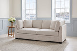 Rovigo sofa in a Halifax living room with blue-grey wainscoting and sash windows onto the harbour
