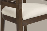 Close-up of the linen-look seat, the wood seat frame, the arm block and a front leg of the Walnut Sabaudia counter stool