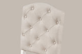 Close-up of the Saluzzo chair back: diamond tufting with fabric-covered buttons and the arched top
