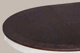 Close-up of the Saluzzo oak-veneer top: cross-grain border segments, the seam and the distressed white apron