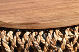 Close-up of the Sambuca top: the edge of the reclaimed teak disc resting on the twisted abaca rope