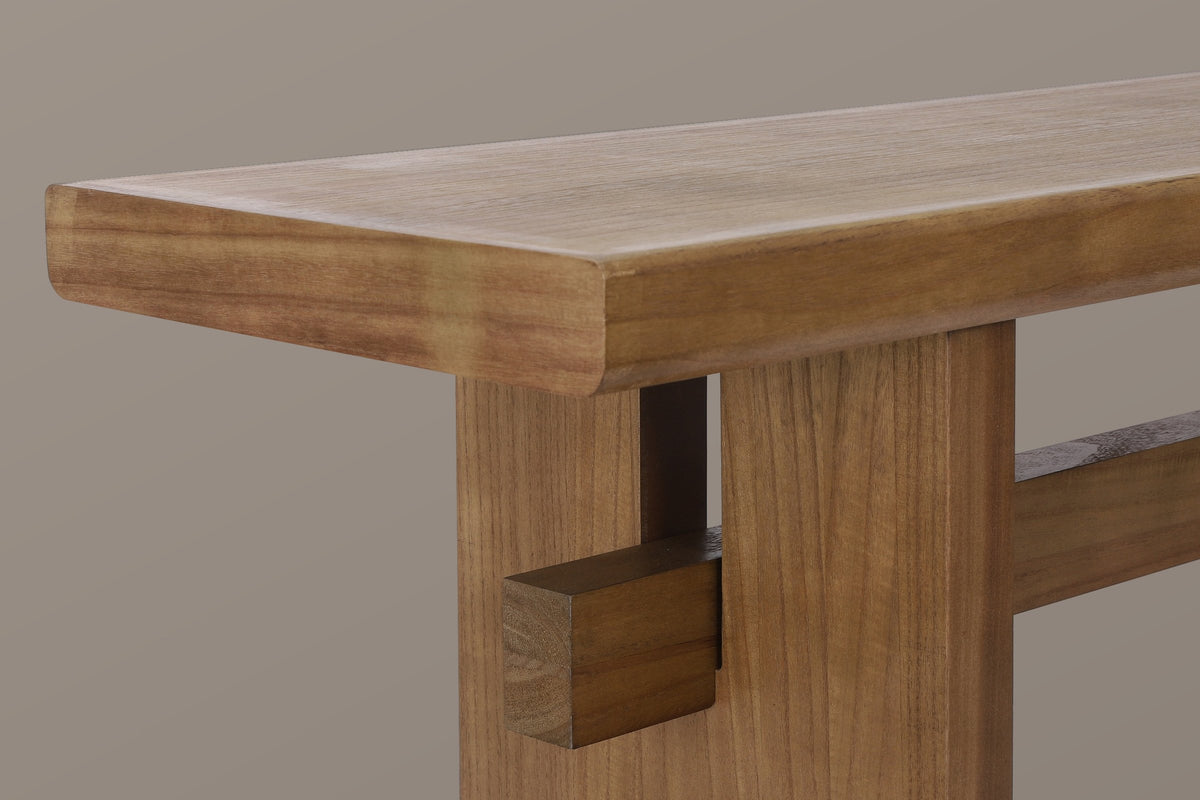 Close-up of an antique brown slab leg: the slot under the top