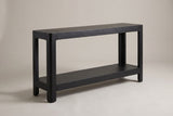 Sarnico farmhouse console table in black, three-quarter view on a warm grey studio backdrop