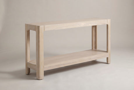 Sarnico farmhouse console table in the natural pine finish, three-quarter view on a warm grey studio backdrop