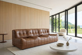 Sassocorvaro armless leather sofa in Antique Sienna in a Collingwood house, with a white-oak slat wall
