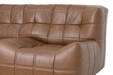 Close-up of the Sassocorvaro corner in Antique Sienna: padded back squares with small round buttons above the seat block's ro