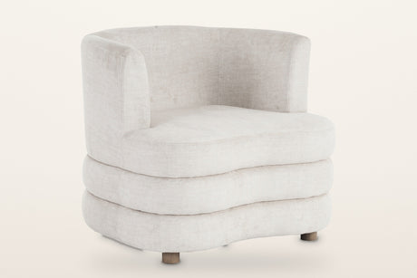 Sauze stacked-roll velvet accent chair in beige, three-quarter view on a warm white studio backdrop