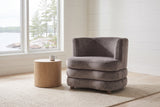Sauze accent chair in dark taupe velvet, front view, in a white-boarded Muskoka cottage living room, the lake and white pines through the window