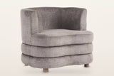 Sauze stacked-roll velvet accent chair in dark taupe, three-quarter view on a warm white studio backdrop