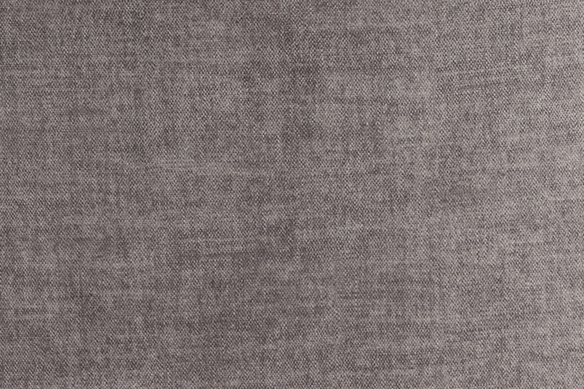 Close-up of the dark taupe velvet: a soft mottled pile in warm grey with a faint mauve cast