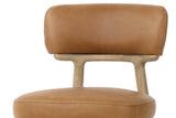 Close-up of the Savoca back band in Tawny leather on its curved ash yoke, above the stitched seat