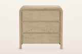 Scheggino chest in Brown, front view on a warm white studio backdrop: the waterfall top and sides