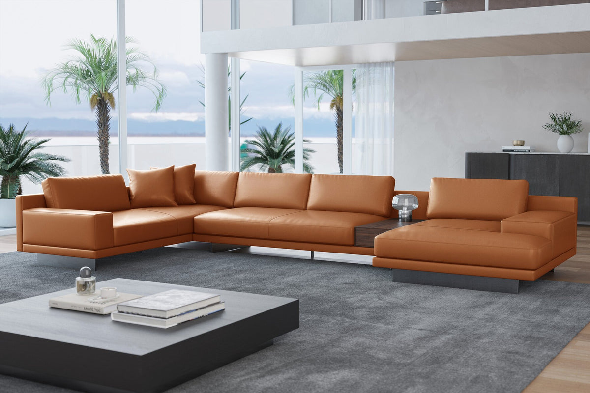 Alessandro cognac leather sectional in a sunlit living room