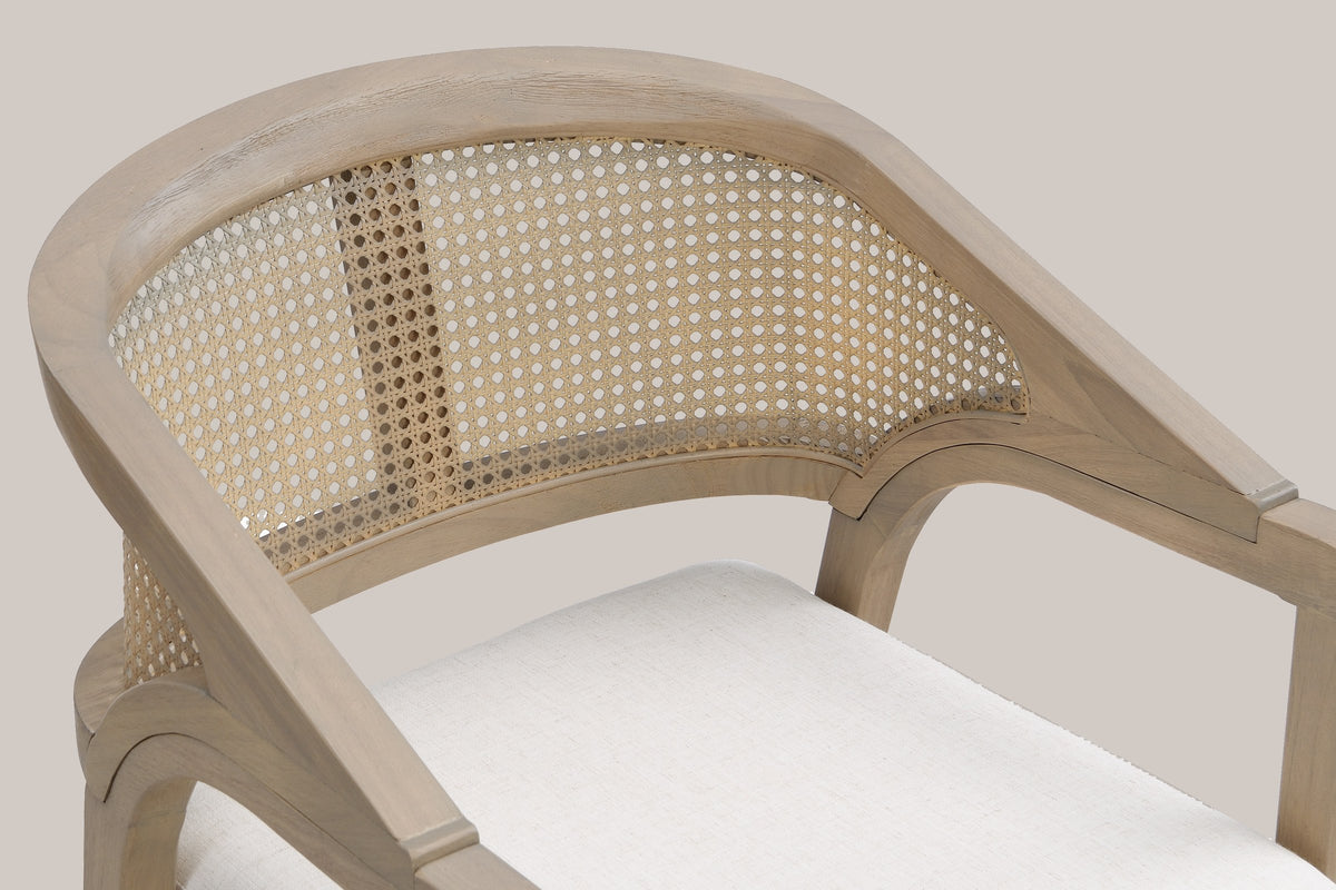 Close-up of the wide curved top rail, the cane-look weave panel with its denser centre strip