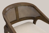 Close-up of the wide curved top rail, the cane-look weave panel with its denser centre strip
