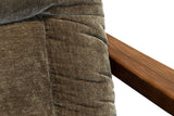 Close-up of the Servigliano back cushion in Green: soft fabric with gathered sides, beside the flat ash arm