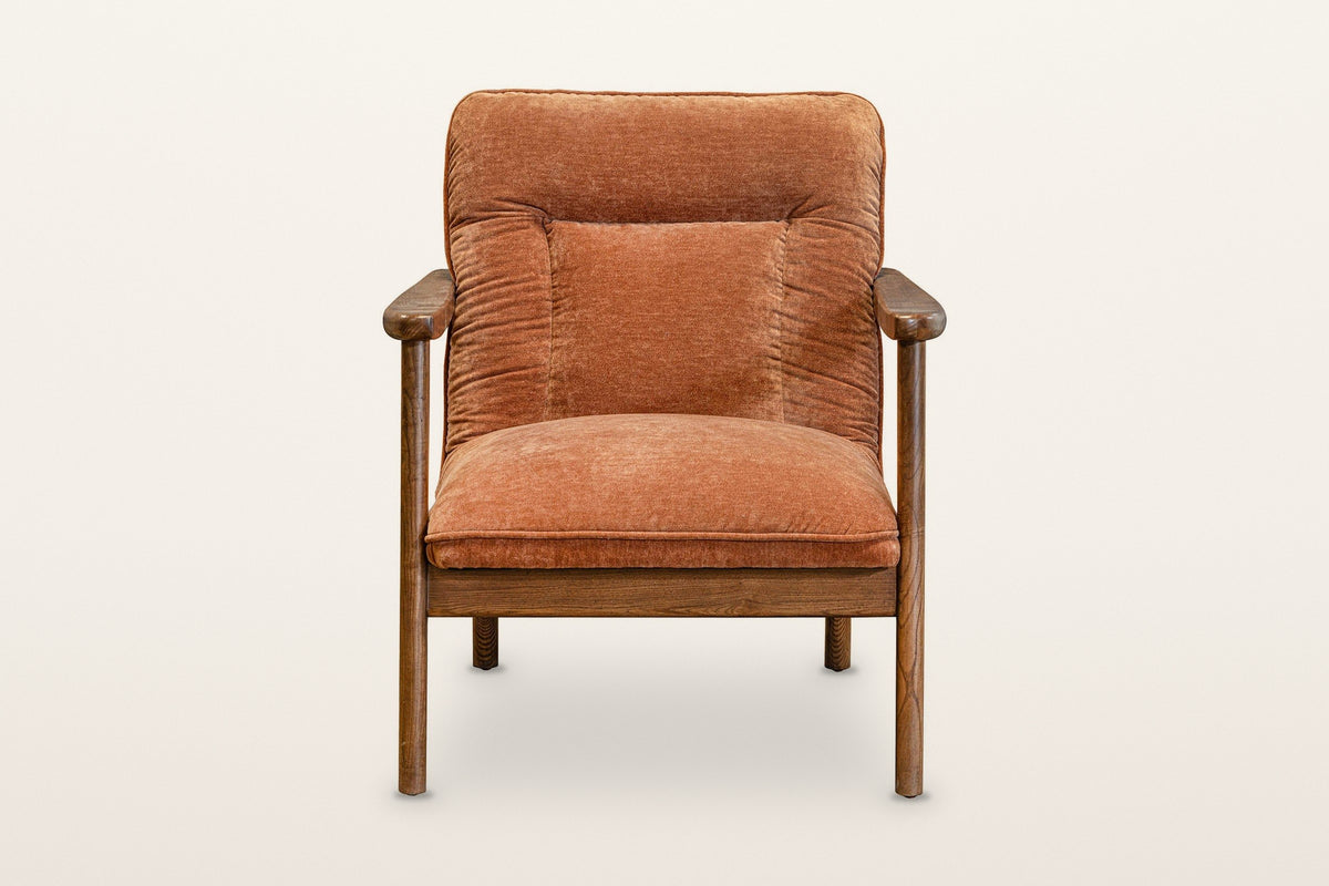 Servigliano accent chair in Rust, straight front view on a warm white studio backdrop: flat wooden arms resting on the two fr