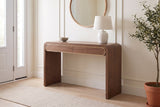 Sestri console table in walnut in a bright Ottawa front hall, a linen lamp and a stoneware bowl on top
