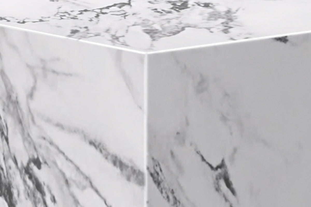 Close-up of a Sloane cube corner with crisp edges and grey veining
