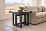 Soave side table in black beside an oatmeal linen sofa in a Calgary living room, the foothills through the window