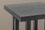 Close-up of the corner of the 2.4-inch top in black: open oak-like grain on the face, straight grain on the edge