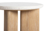 Close-up of the Sorano top: seashell terrazzo with pale pink and mauve flecks, a rounded edge, and the limed oak slabs below
