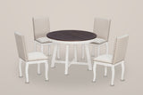 Spilamberto five-piece dining set on a warm grey studio backdrop: a round table with a dark top and a white X-stretcher base